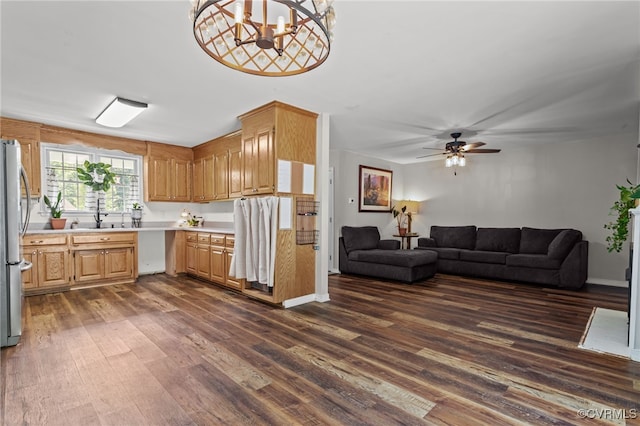 11501 Courthouse Rd, Dinwiddie, VA 23841 - kitchen featuring dark wood finished floors, light countertops, freestanding refrigerator, ceiling fan, and open floor plan