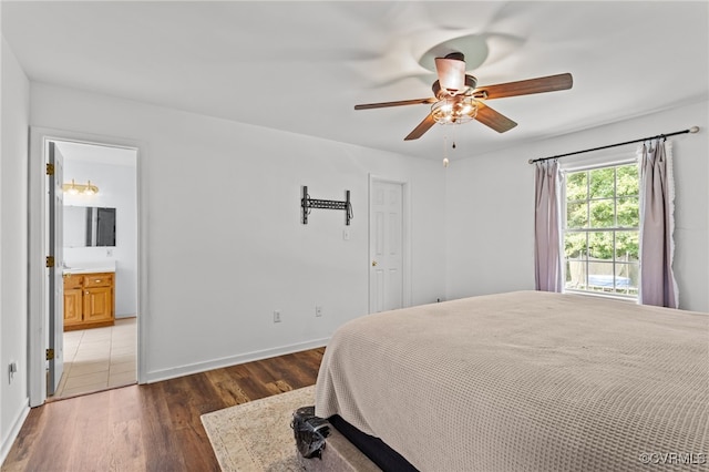 11501 Courthouse Rd, Dinwiddie, VA 23841 - bedroom with wood finished floors, ensuite bath, and ceiling fan