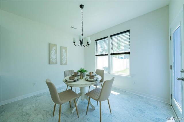 5311 Benmable Ct, Glen Allen, VA 23059 - dining room featuring a chandelier and light marble finish flooring
