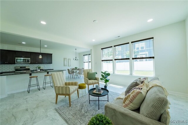 5311 Benmable Ct, Glen Allen, VA 23059 - living room featuring recessed lighting and light marble finish floors