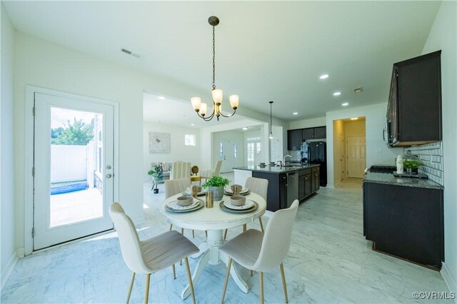 5311 Benmable Ct, Glen Allen, VA 23059 - dining room featuring recessed lighting, light marble finish flooring, and a chandelier