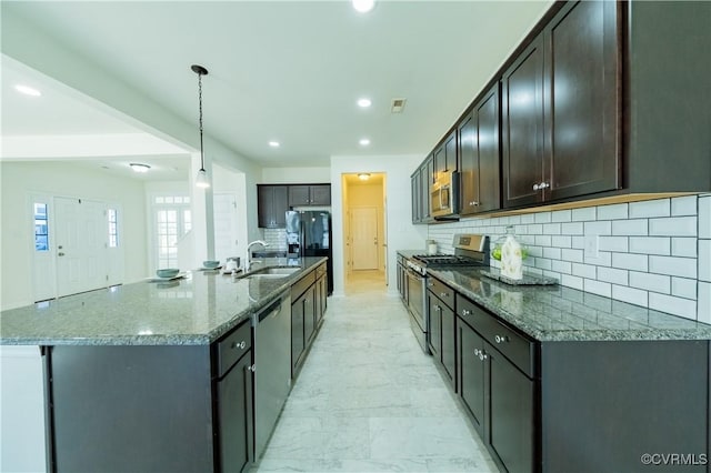 5311 Benmable Ct, Glen Allen, VA 23059 - kitchen with appliances with stainless steel finishes, tasteful backsplash, recessed lighting, dark stone countertops, and hanging light fixtures