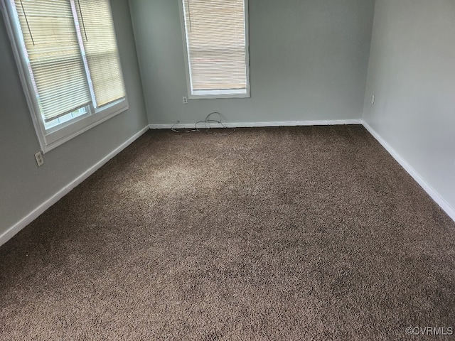 137 Virginia Ave, Petersburg, VA 23803 - spare room with dark colored carpet and baseboards