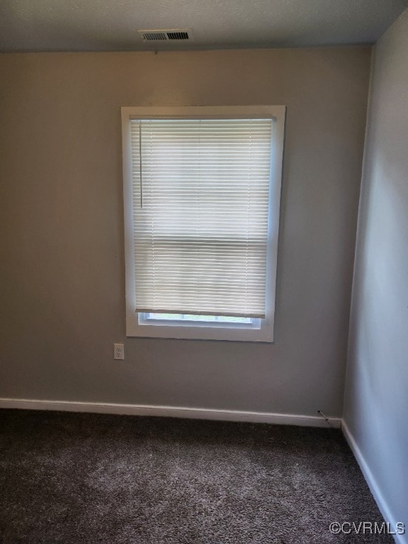 137 Virginia Ave, Petersburg, VA 23803 - carpeted empty room featuring baseboards