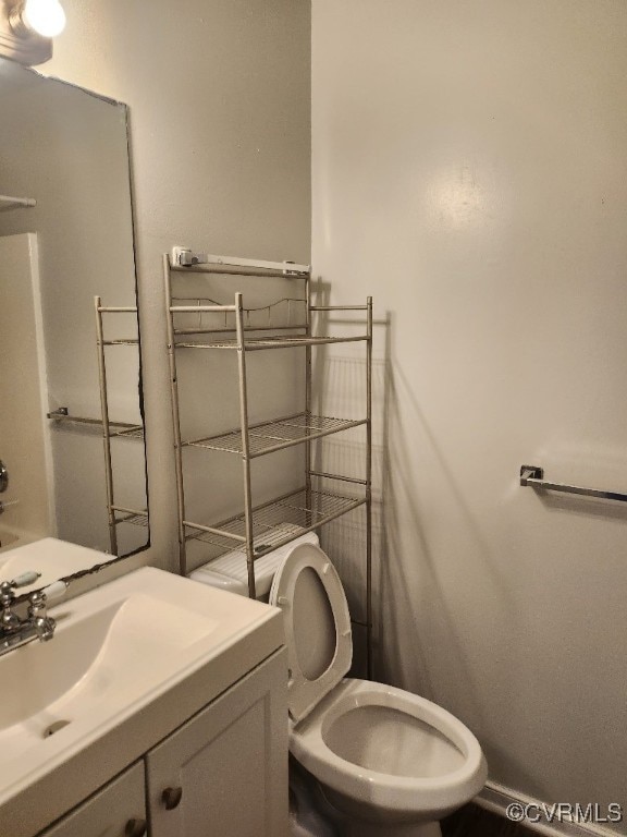 137 Virginia Ave, Petersburg, VA 23803 - bathroom featuring toilet and vanity