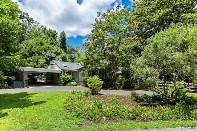 7800 Wood Rd, Henrico, VA 23229 - view of front facade with driveway, a front yard, and a carport