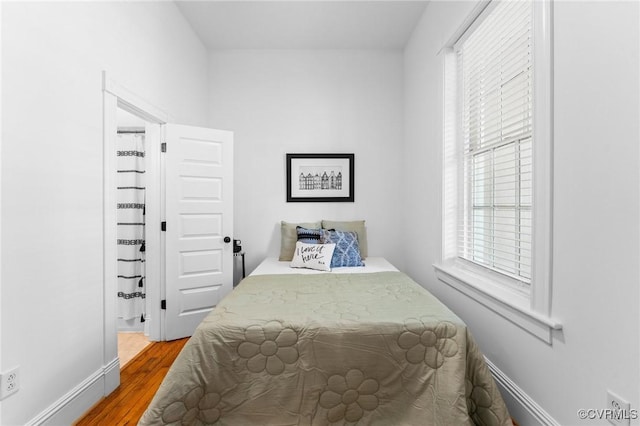 603 N Allen Ave Unit U1B, Richmond, VA 23220 - bedroom with multiple windows and wood finished floors