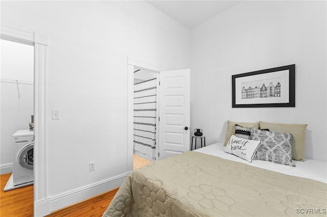 603 N Allen Ave Unit U1B, Richmond, VA 23220 - bedroom featuring wood finished floors and washer / dryer