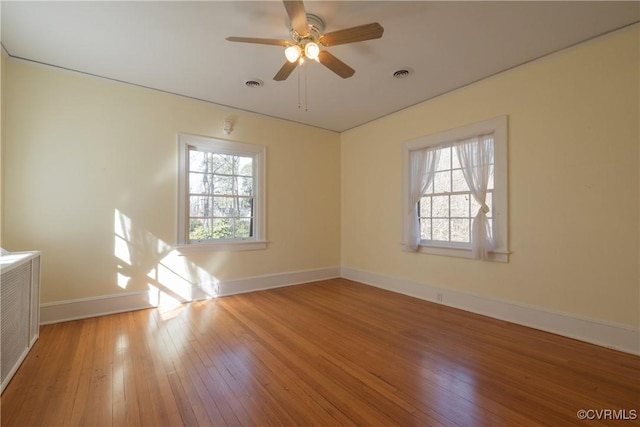 1602 Brandon Ave, Petersburg, VA 23805 - empty room with light wood-style floors and a ceiling fan