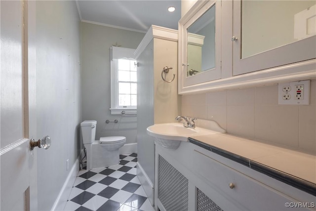 1602 Brandon Ave, Petersburg, VA 23805 - bathroom featuring tile patterned floors, vanity, backsplash, and crown molding