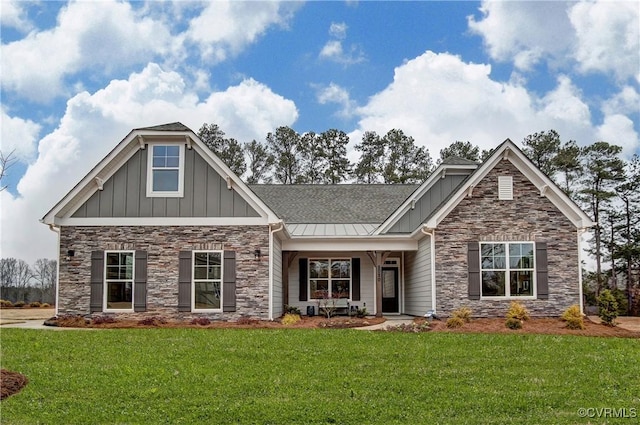 3101 Rocketts Ridge Pl, Sandy Hook, VA 23153 - craftsman-style home featuring stone siding, board and batten siding, and a front lawn