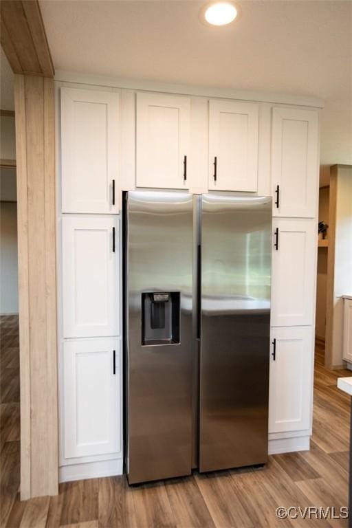 12 Sunset Ln, Rice, VA 23966 - kitchen featuring stainless steel fridge with ice dispenser, white cabinetry, and light wood-style flooring