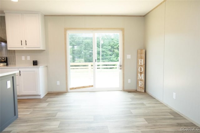 12 Sunset Ln, Rice, VA 23966 - kitchen featuring light wood-style floors, light countertops, and white cabinets