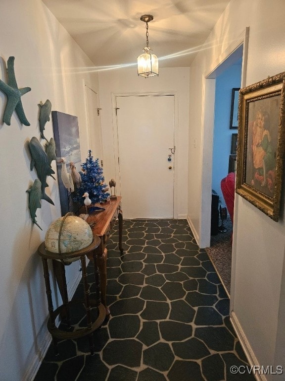 5403 Chesdin Rd, North Dinwiddie, VA 23803 - entryway with stone finish flooring and baseboards