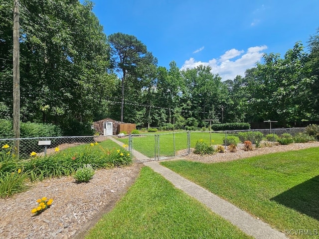 5403 Chesdin Rd, North Dinwiddie, VA 23803 - view of yard featuring a storage unit