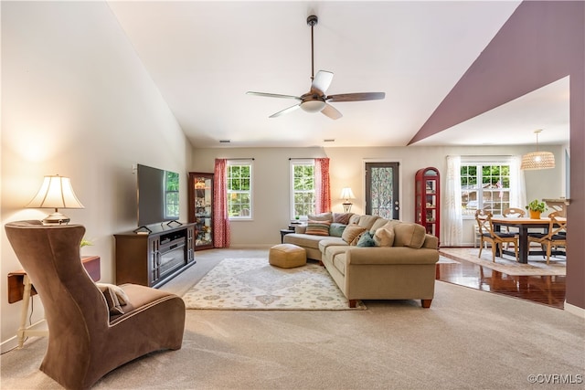 4672 Bell Rd, Powhatan, VA 23139 - carpeted living room featuring vaulted ceiling, healthy amount of natural light, and a ceiling fan