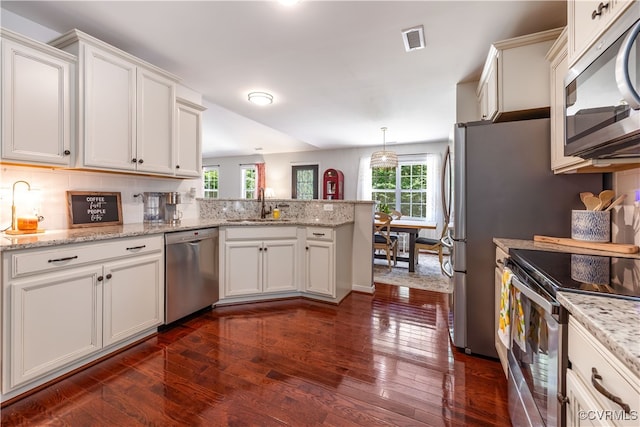 4672 Bell Rd, Powhatan, VA 23139 - kitchen with stainless steel appliances, a peninsula, dark wood-type flooring, and white cabinetry