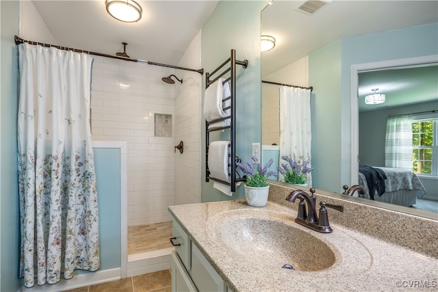 4672 Bell Rd, Powhatan, VA 23139 - full bathroom featuring a tile shower, vanity, tile patterned flooring, and ensuite bathroom
