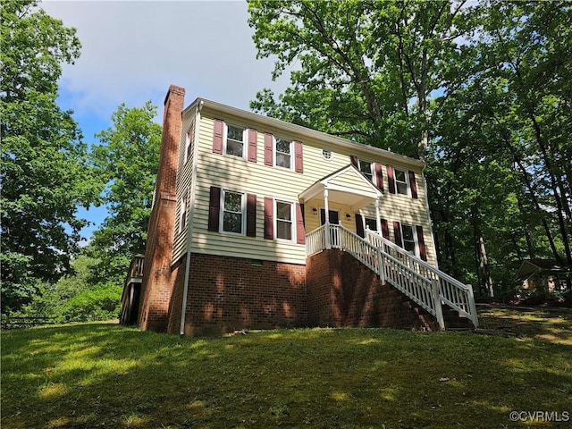 6924 Longview Dr, New Kent, VA 23141 - colonial home with a chimney and a front lawn