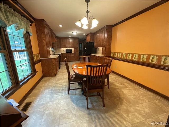 2458 Happy Hill Ln, Mechanicsville, VA 23111 - dining area featuring a chandelier, ornamental molding, and recessed lighting