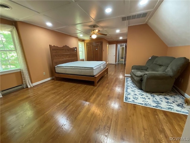 2458 Happy Hill Ln, Mechanicsville, VA 23111 - bedroom with a baseboard radiator, wood finished floors, recessed lighting, and vaulted ceiling