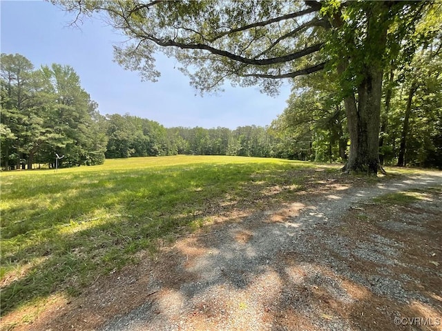 2458 Happy Hill Ln, Mechanicsville, VA 23111 - view of yard with a forest view