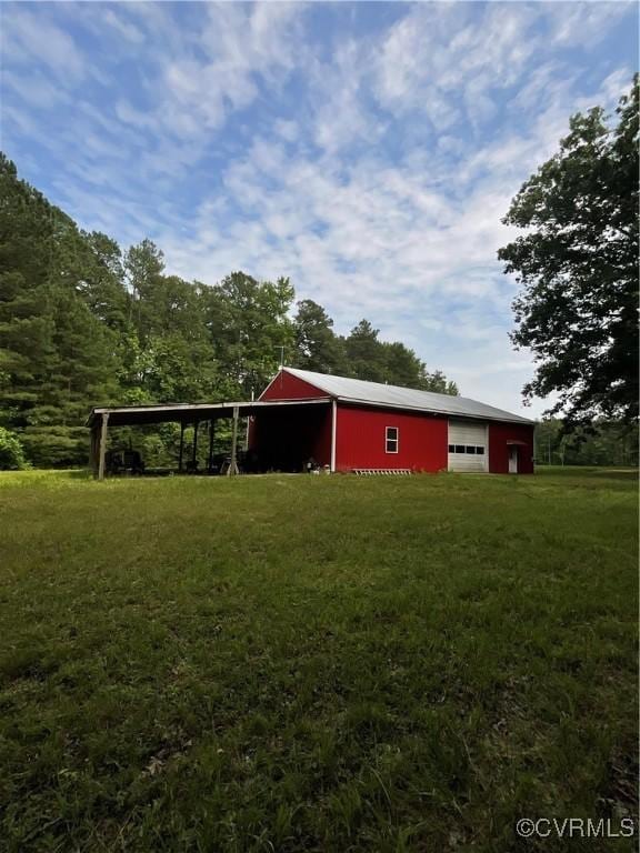2458 Happy Hill Ln, Mechanicsville, VA 23111 - view of pole building with a yard and driveway