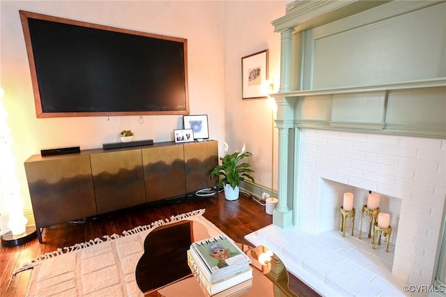 7 N Davis Ave, Richmond, VA 23220 - living room with dark wood-type flooring and ornate columns