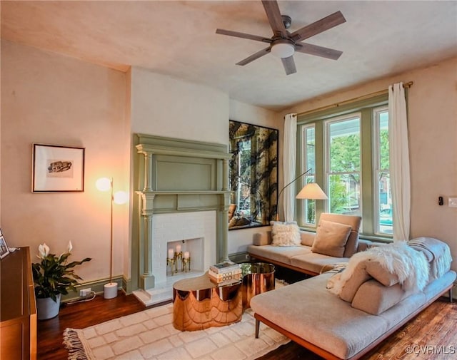 7 N Davis Ave, Richmond, VA 23220 - living room featuring wood finished floors, a brick fireplace, and ceiling fan