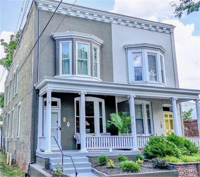 7 N Davis Ave, Richmond, VA 23220 - view of front of home featuring brick siding and covered porch