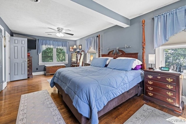 4312 Erlene Ct, Chester, VA 23831 - bedroom with wood finished floors, ceiling fan, and beamed ceiling