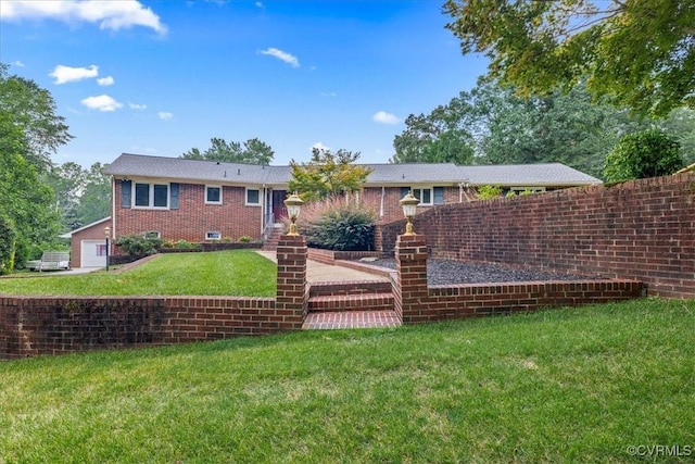 4312 Erlene Ct, Chester, VA 23831 - rear view of house featuring a yard and brick siding