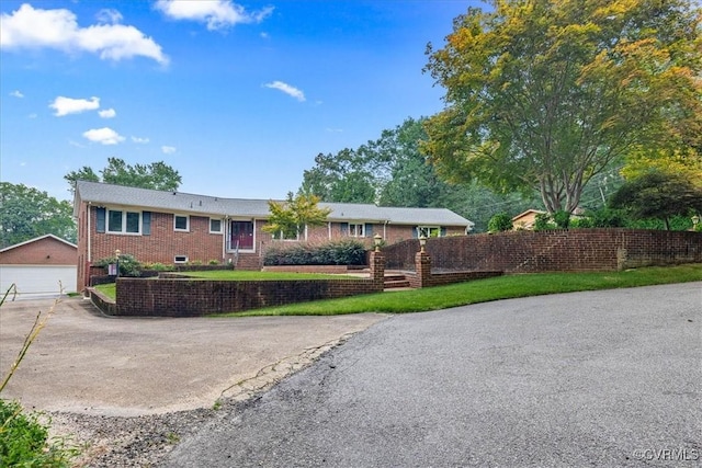 4312 Erlene Ct, Chester, VA 23831 - ranch-style house featuring brick siding, an outdoor structure, and a detached garage
