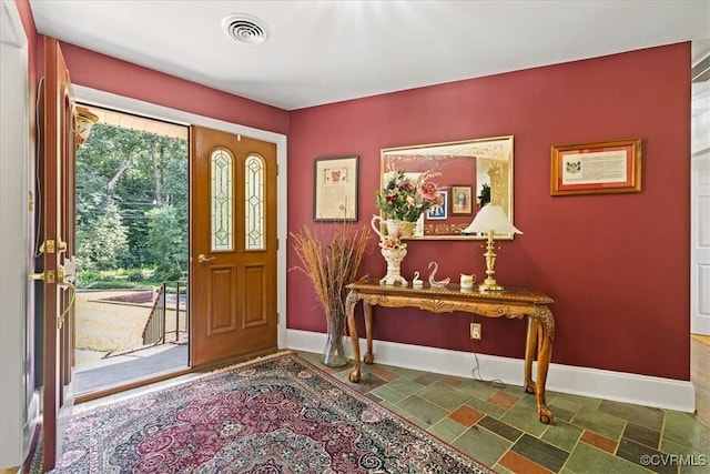 4312 Erlene Ct, Chester, VA 23831 - foyer entrance featuring baseboards and stone finish floors