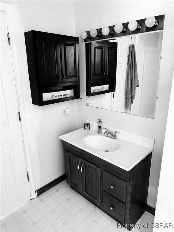 162 Twin Oaks Rd, Water View, VA 23180 - bathroom featuring vanity and baseboards