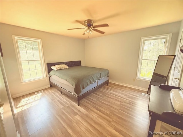 162 Twin Oaks Rd, Water View, VA 23180 - bedroom featuring light wood-style flooring and a ceiling fan