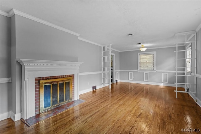 3205 Birchbrook Rd, Henrico, VA 23228 - unfurnished living room with wood finished floors, a brick fireplace, and ornamental molding