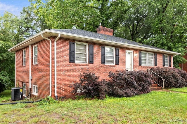 3205 Birchbrook Rd, Henrico, VA 23228 - ranch-style house featuring brick siding, a front lawn, a chimney, and view of wooded area