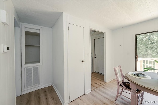 21113 River Rd, Dinwiddie, VA 23885 - dining space with light wood-style floors and a textured ceiling