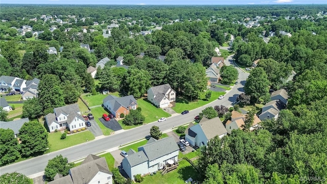6118 Pond Grass Rd, Mechanicsville, VA 23111 - aerial overview of property's location with nearby suburban area and a heavily wooded area