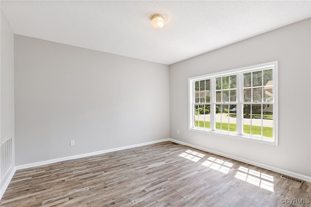 6118 Pond Grass Rd, Mechanicsville, VA 23111 - empty room featuring wood finished floors and baseboards