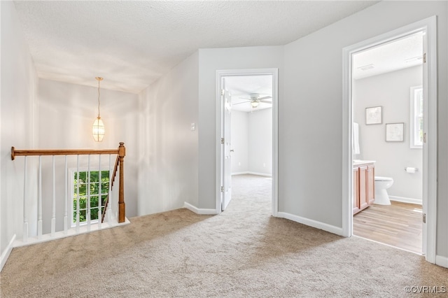 6118 Pond Grass Rd, Mechanicsville, VA 23111 - hallway featuring carpet, an upstairs landing, and a textured ceiling