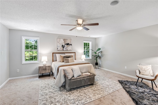 6118 Pond Grass Rd, Mechanicsville, VA 23111 - bedroom featuring carpet floors, multiple windows, a textured ceiling, and ceiling fan