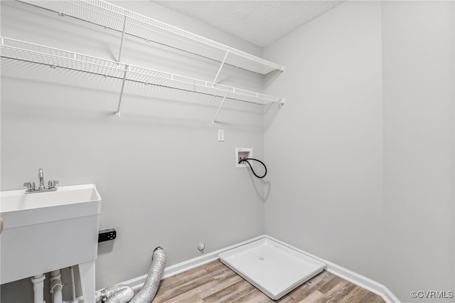 6118 Pond Grass Rd, Mechanicsville, VA 23111 - laundry room featuring washer hookup, light wood-type flooring, and gas dryer hookup