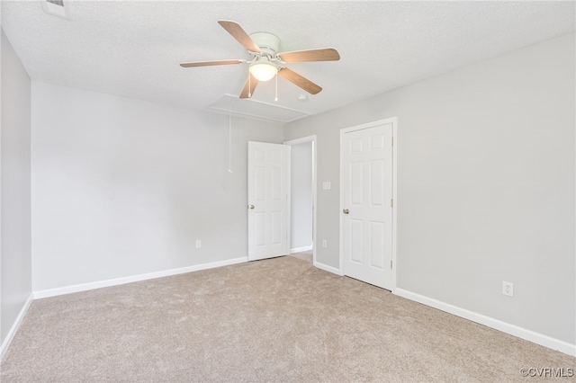 6118 Pond Grass Rd, Mechanicsville, VA 23111 - carpeted empty room with a ceiling fan and attic access