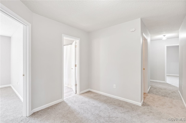 6118 Pond Grass Rd, Mechanicsville, VA 23111 - unfurnished room featuring carpet and a textured ceiling