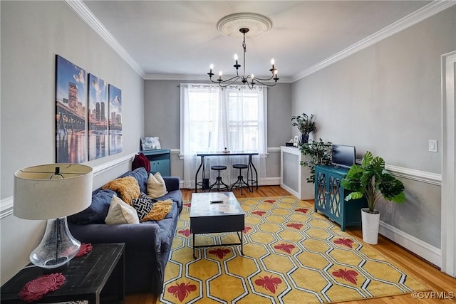 3102 W Grace St, Richmond, VA 23221 - living room with a chandelier, wood finished floors, and ornamental molding