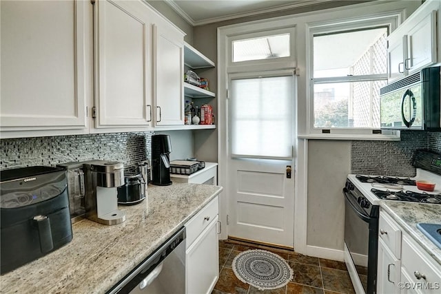 3102 W Grace St, Richmond, VA 23221 - kitchen featuring black appliances, decorative backsplash, white cabinets, ornamental molding, and healthy amount of natural light