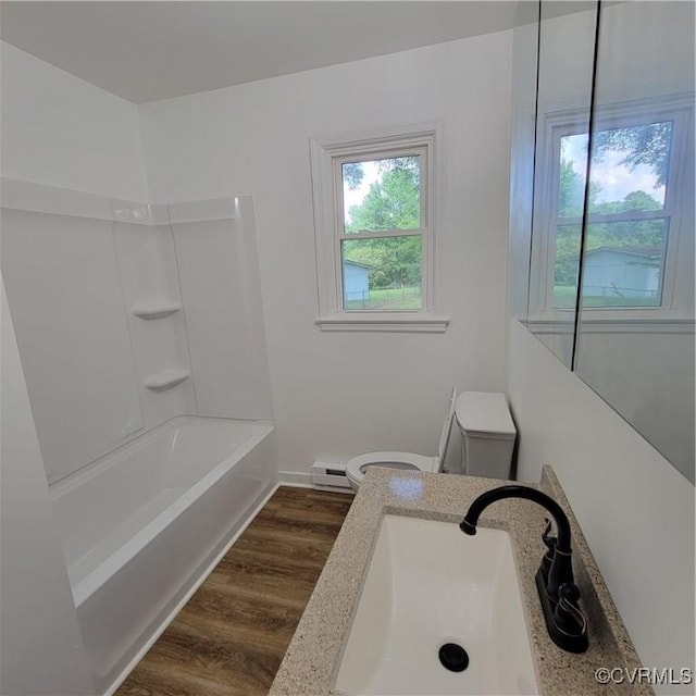 3017 Wright Rd, Petersburg, VA 23805 - bathroom featuring healthy amount of natural light, wood finished floors,  shower combination, and vanity