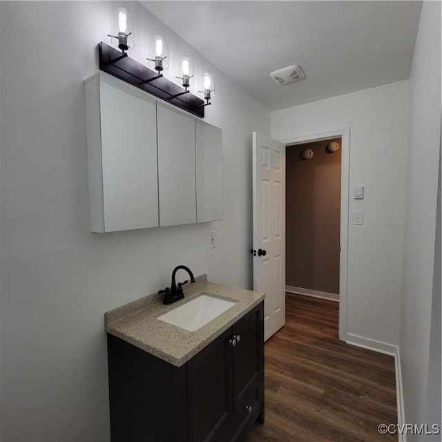 3017 Wright Rd, Petersburg, VA 23805 - bathroom featuring vanity and wood finished floors
